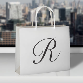 Rankins Jewellers white bag with London backdrop