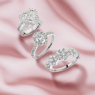 Rankins Jewellers diamond rings on pink satin 